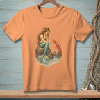 T-shirt with illustration of a mermaid and lobster by the water.
