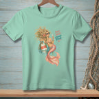Mint green t-shirt with mermaid graphic and text "BAD HAIR GOOD POUR."