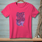 Pink t-shirt with "Don't Test The Waters" text, mermaid tail, and crab graphic.