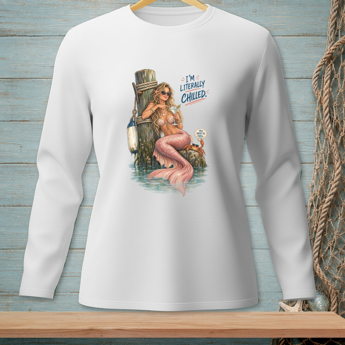 White long-sleeve shirt with a mermaid graphic and the text "I'M LITERALLY CHILLED".