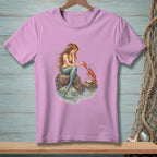 Mermaid sitting on rocks, interacting with a lobster and a pearl.