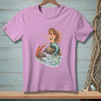 Pink t-shirt with a mermaid and lobster by the ocean waves.