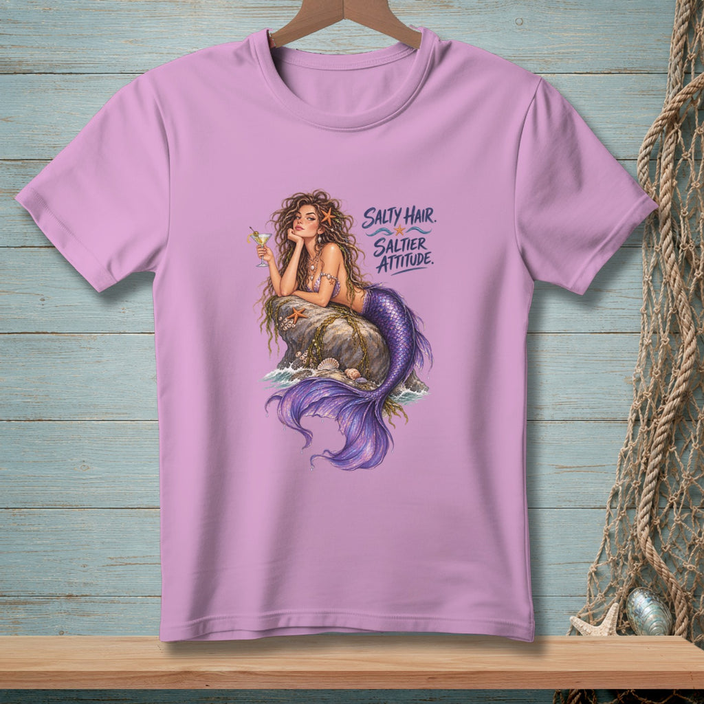 Pink t-shirt with a mermaid illustration and text "Salty Hair. Saltier Attitude."