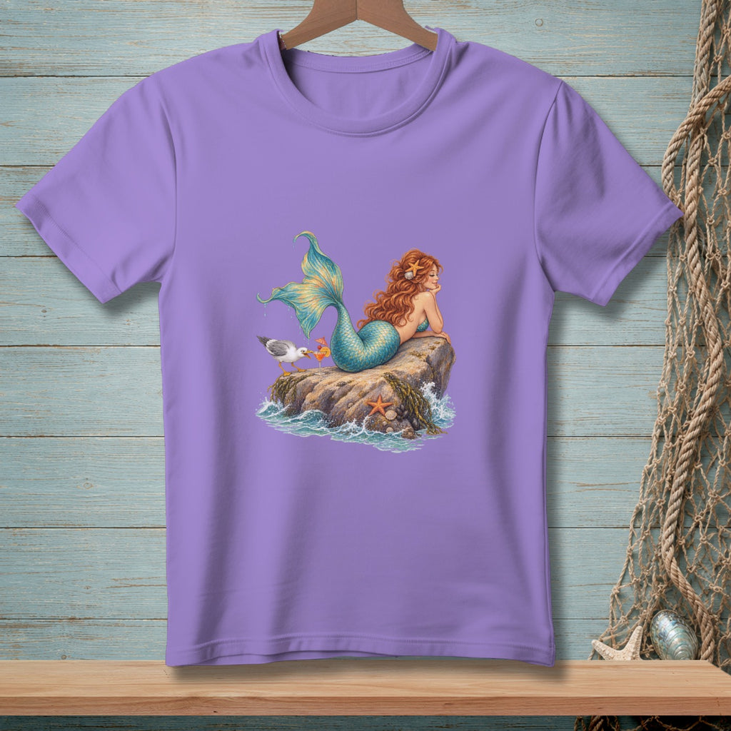 Purple t-shirt with a mermaid, seagull, and starfish on a rock.