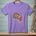Purple t-shirt with a sleeping mermaid and fish illustration on the front.