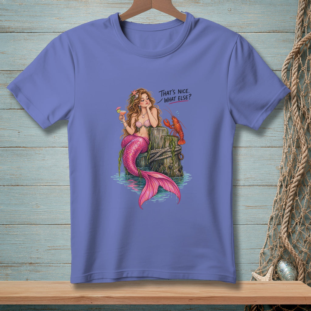 Mermaid with pink tail and cocktail with lobster, text "That's nice. What else?"