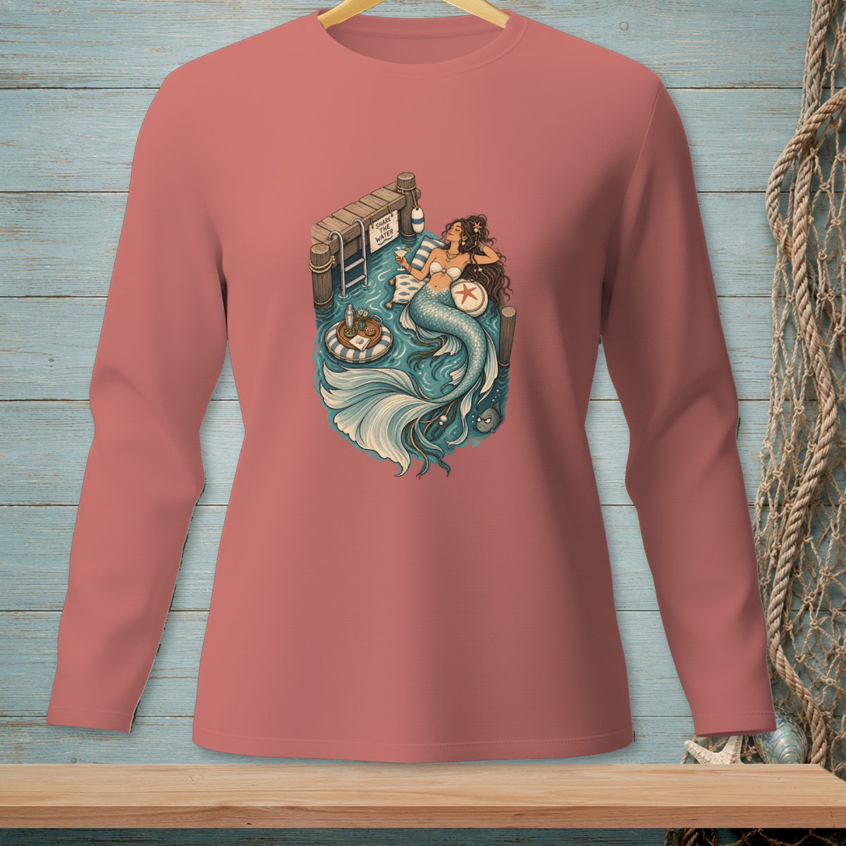 Mermaid on a dock with "Share the water" sign and a drink.