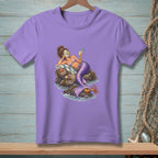 Mermaid relaxing on rocks with face mask and cocktail, purple t-shirt design.