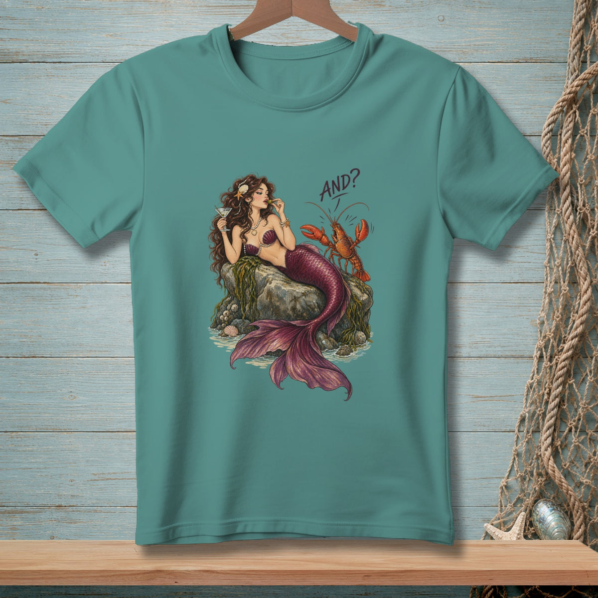 Mermaid with lobster and martini glass, text "AND?".