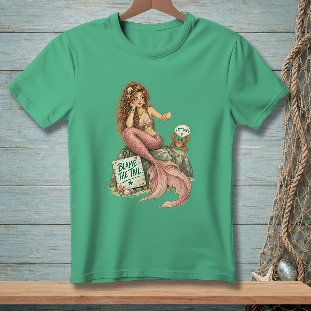 Green t-shirt with a mermaid, crab, and sign that reads "Blame the Tail".