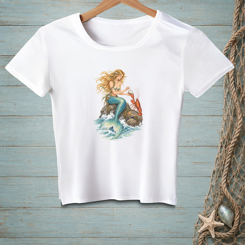 White t-shirt with a mermaid, lobster, and seashells graphic.