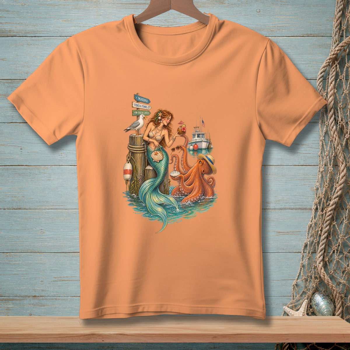 Mermaid and octopus with marina signs and boat on a coral t-shirt.