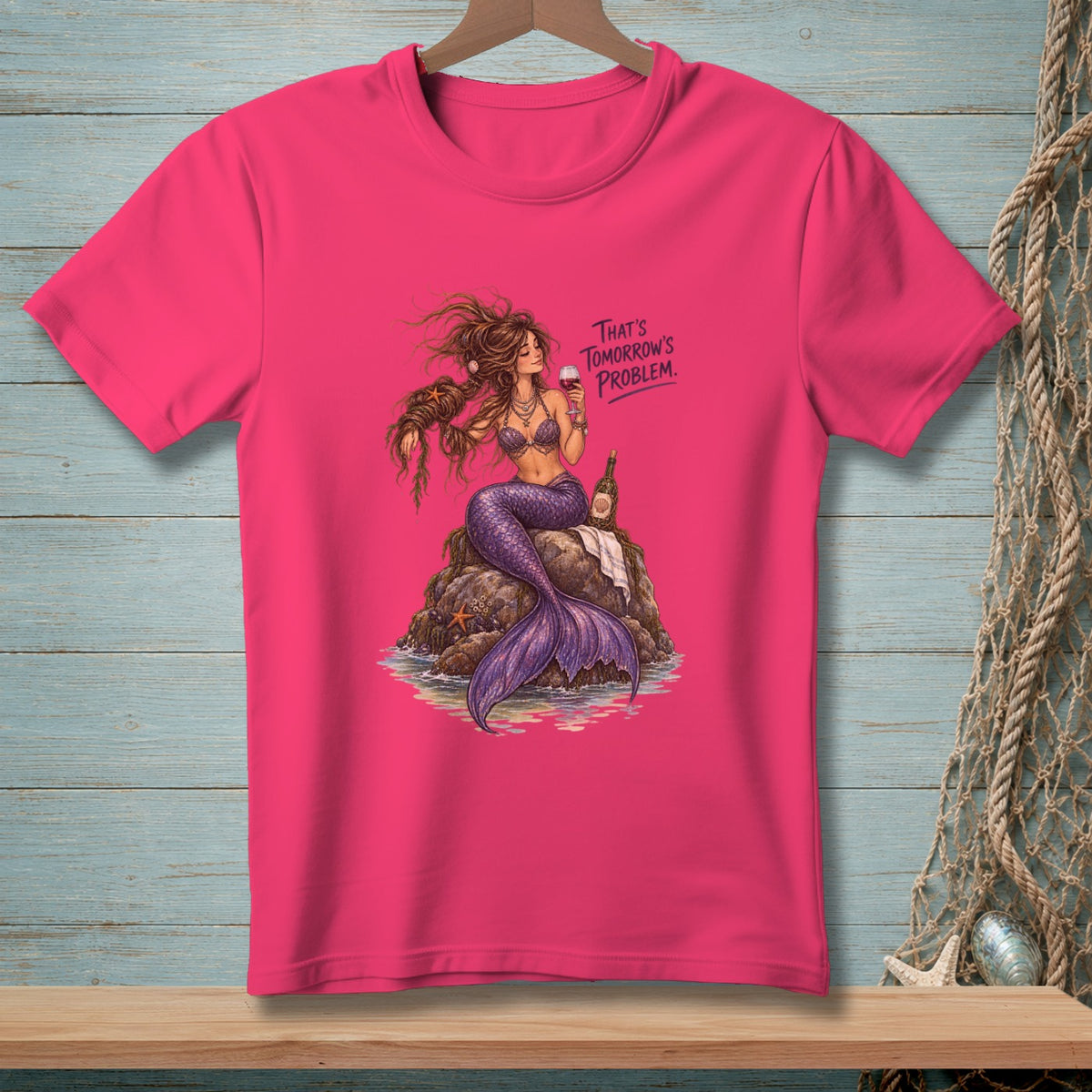 Pink t-shirt with a mermaid holding a drink and the text "That's Tomorrow's Problem."