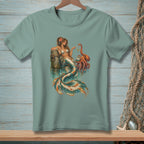 Mermaid showing necklace to octopus by a wooden post in water.