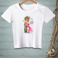 White t-shirt with a mermaid design saying "It's Called Ocean Volume."