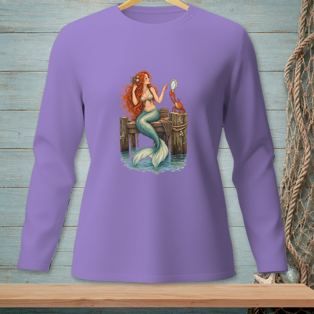 Mermaid with red hair combing on a dock with a crab holding a mirror.