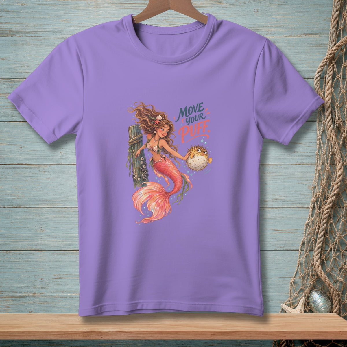 Lavender t-shirt with mermaid graphic and text "Move Your Puffer"