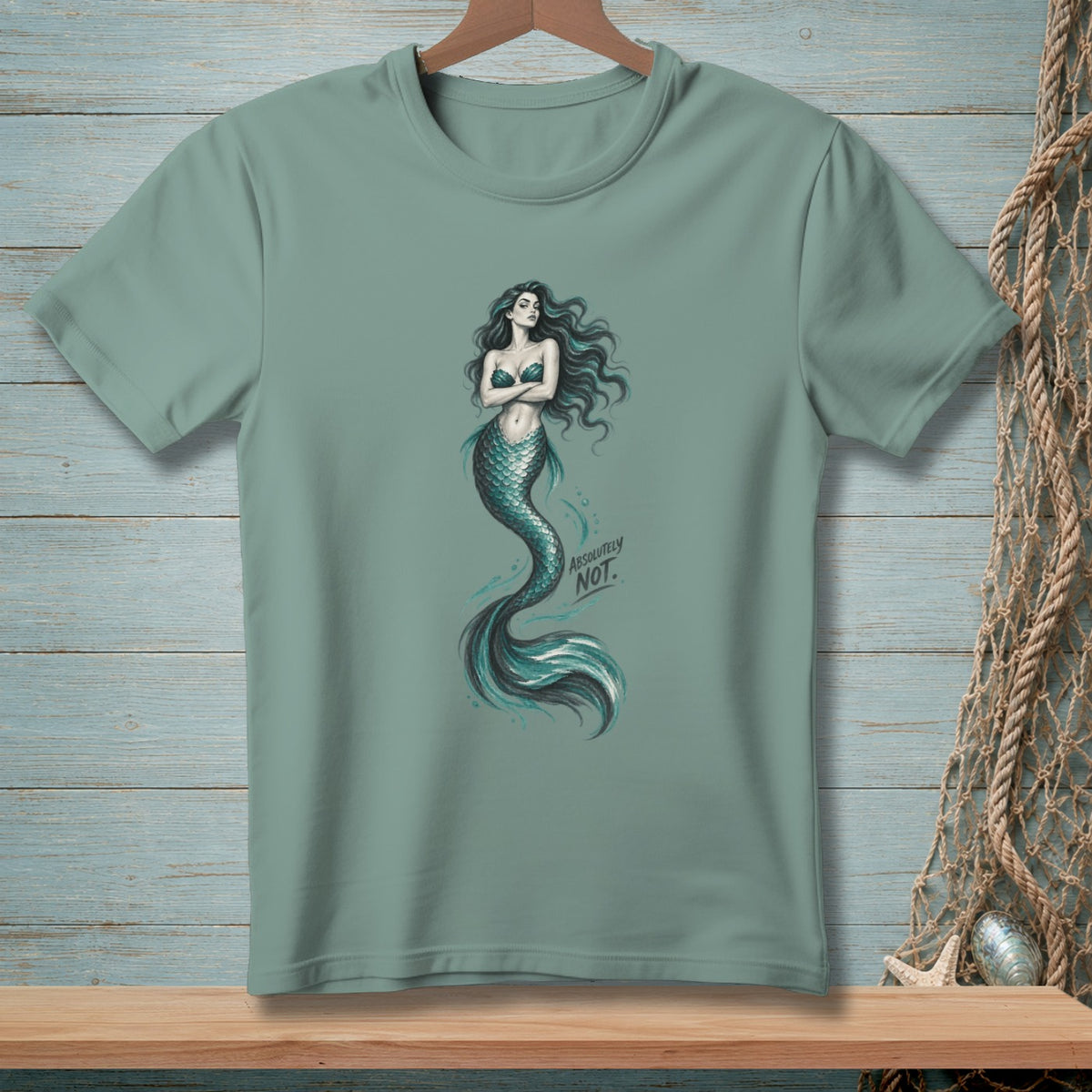 T-shirt with a teal mermaid illustration and the text "ABSOLUTELY NOT."