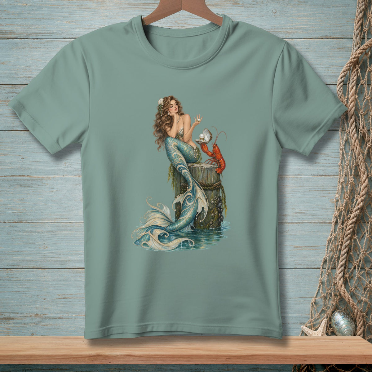 Mermaid holding a pearl on a post with a lobster and sea shells.