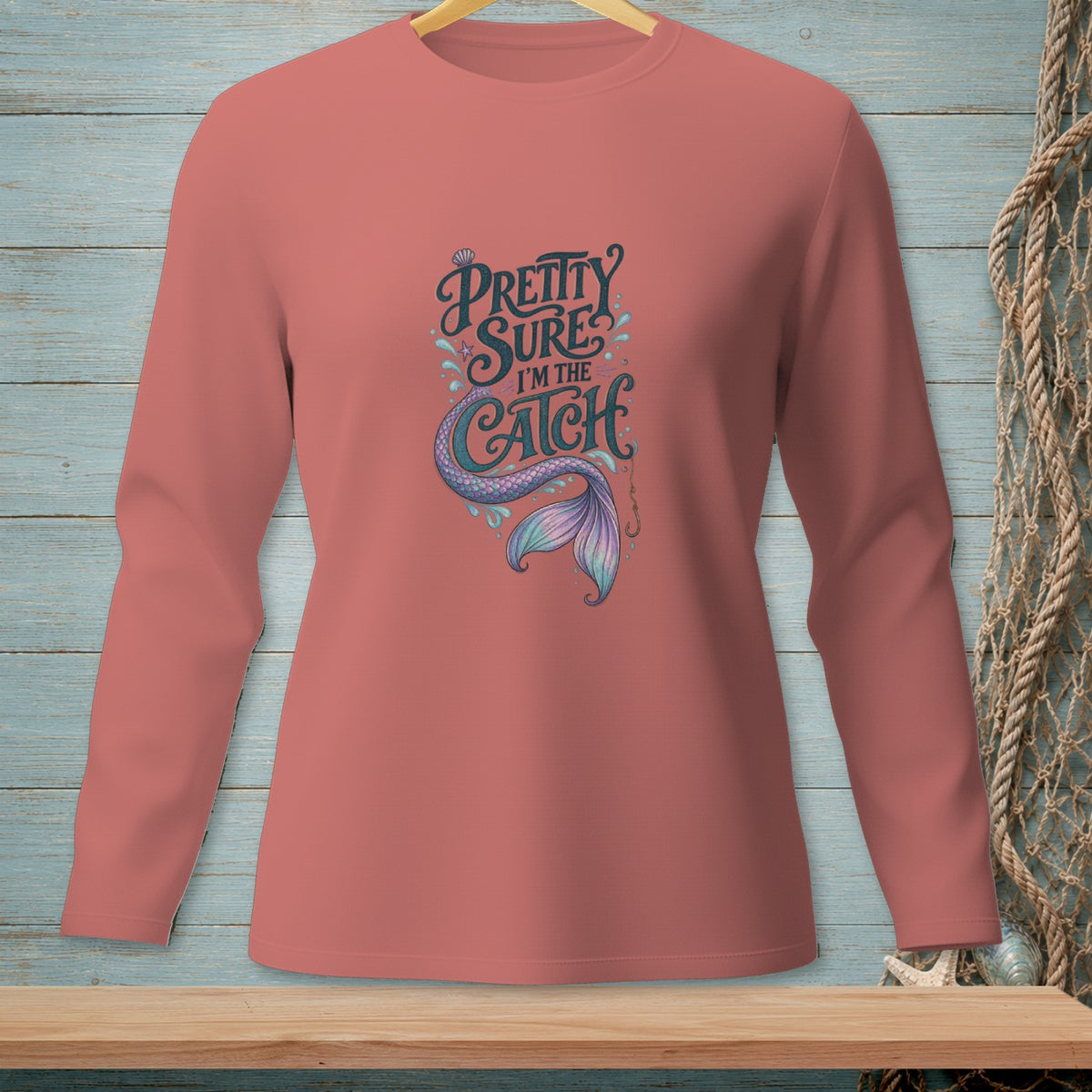 Long sleeve shirt with "Pretty Sure I'm the Catch" text and mermaid tail design.