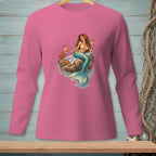 Pink long-sleeve shirt featuring a mermaid with drinks on a rock.