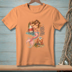 Peach t-shirt with a mermaid, buoy, crab, and the text "Don't start what you can't finish. Pinch me."