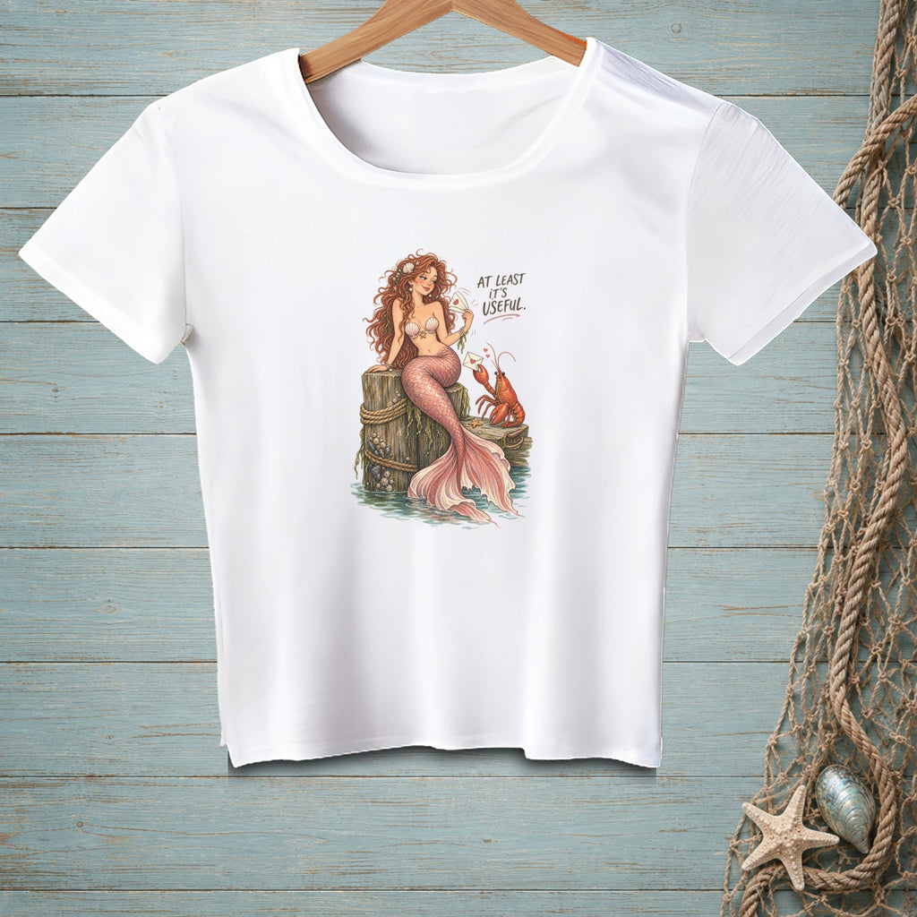 White t-shirt with mermaid and lobster graphic and text "AT LEAST IT'S USEFUL".