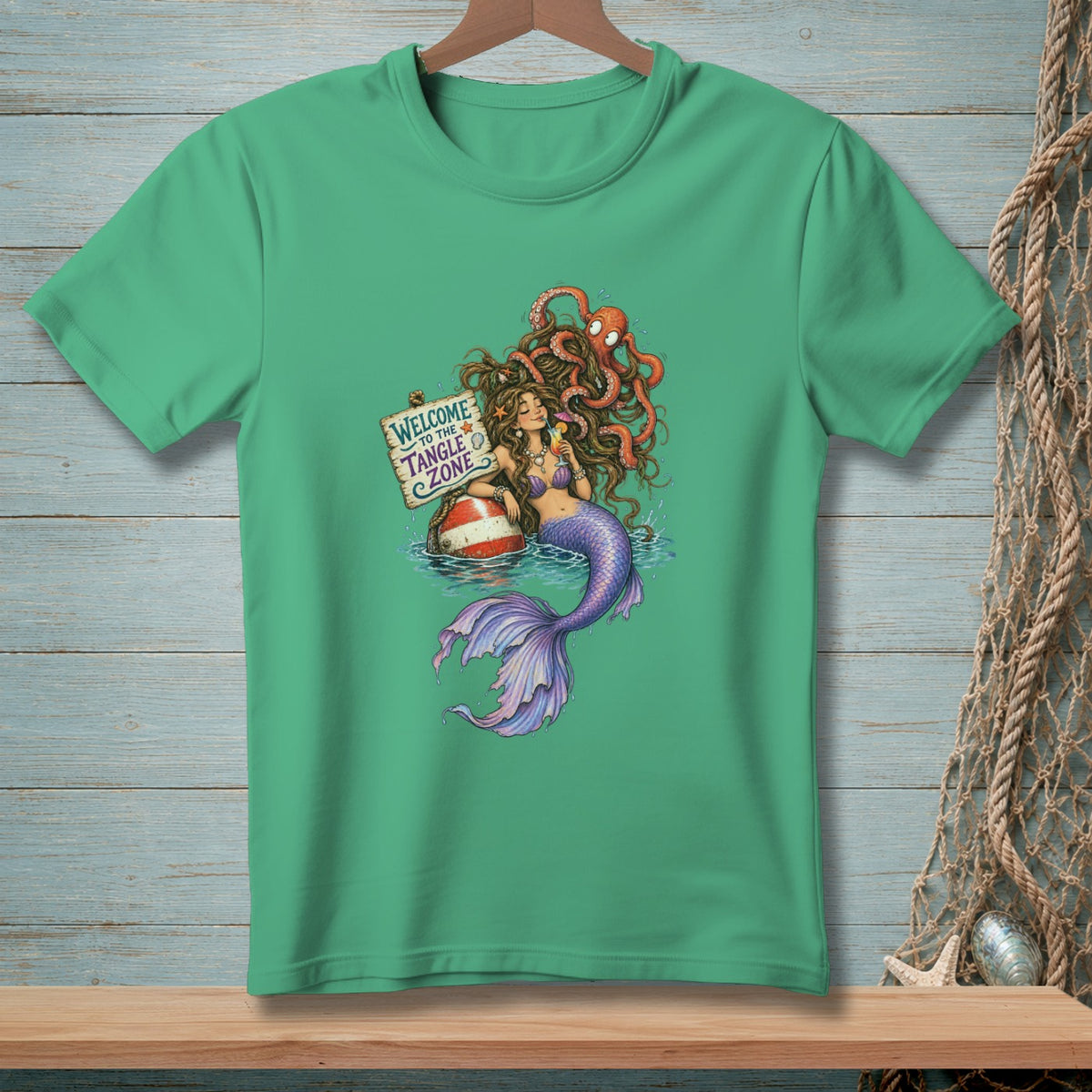 Mermaid holding drink and sign "Welcome to the Tangle Zone" with octopus.