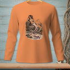 Long-sleeve orange shirt featuring a mermaid sitting on rocks by the sea.