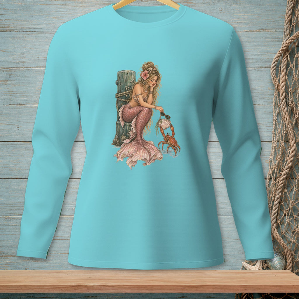 Turquoise long-sleeve shirt featuring a mermaid interacting with a crab.
