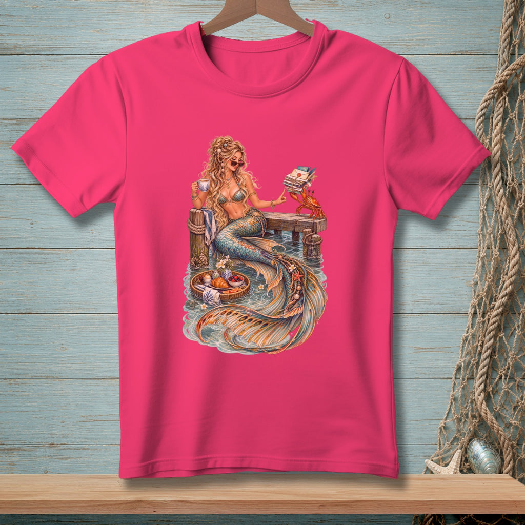 Illustration of a mermaid reading and drinking coffee on a dock with a crab.