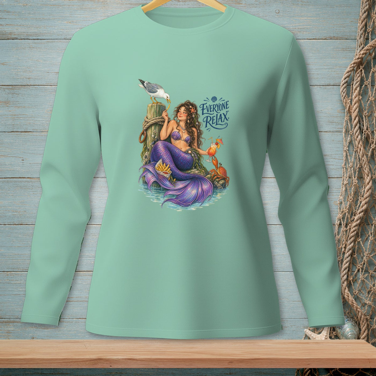 Illustration of a mermaid with purple tail sitting near drinks and French fries with text "EVERYONE RELAX".