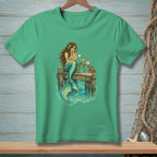 Mermaid reading a letter on a dock with a crab and drinks.