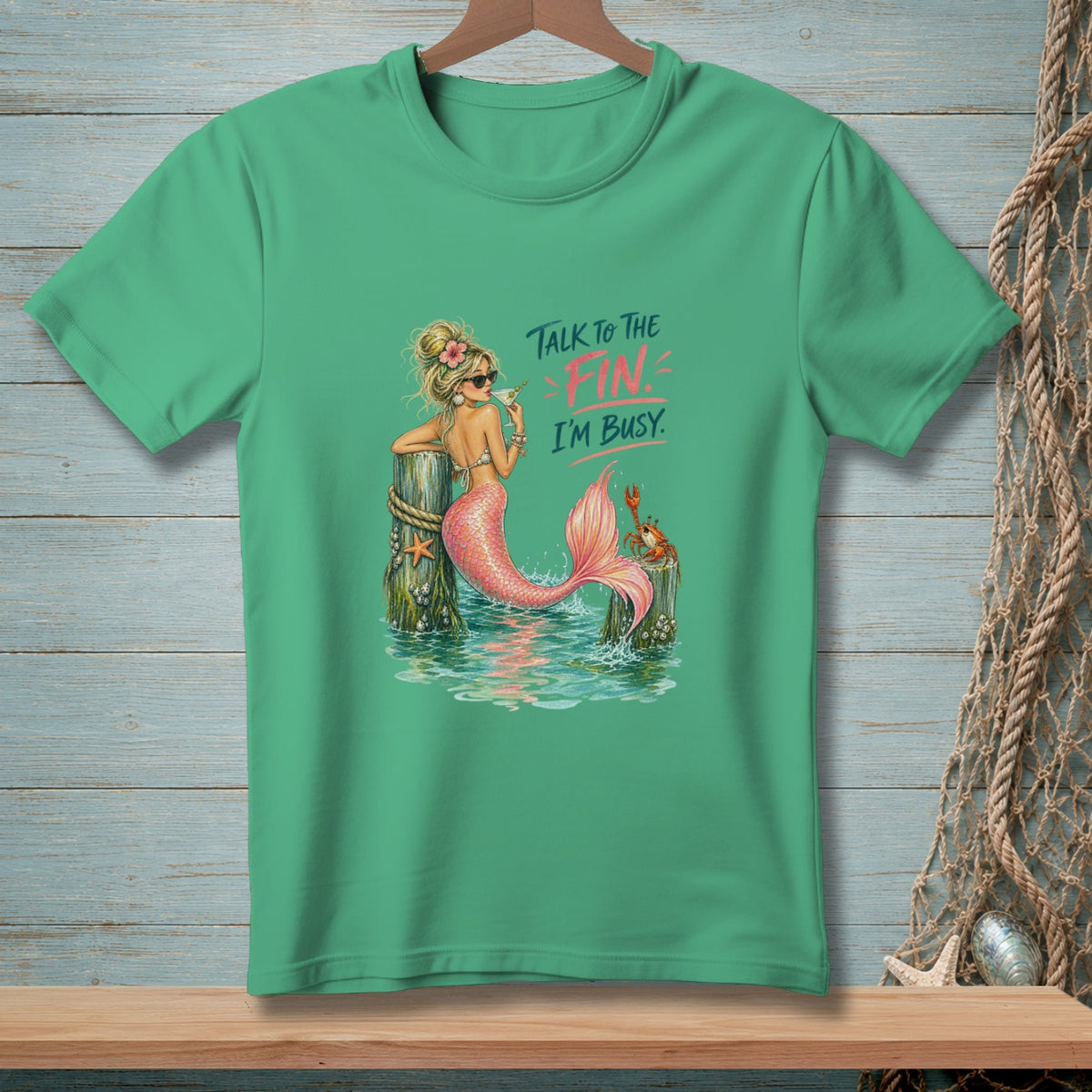 Mermaid with a drink and crab, "Talk to the fin. I'm busy." text.
