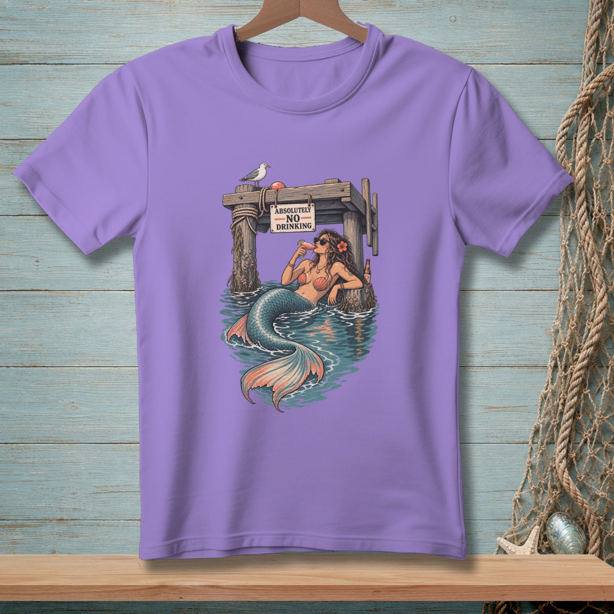 Purple t-shirt with mermaid drinking, seagull, and "Absolutely No Drinking" sign.
