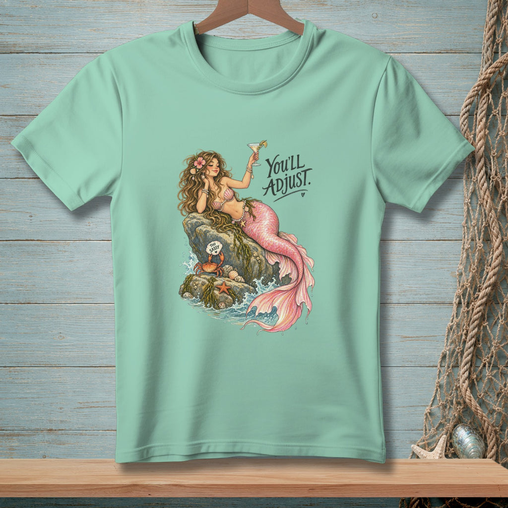 Mint t-shirt with a mermaid holding a martini and text "You'll Adjust."