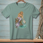 Mermaid sitting on rocks by the ocean holding a sign that says "Fix Your Expectations".