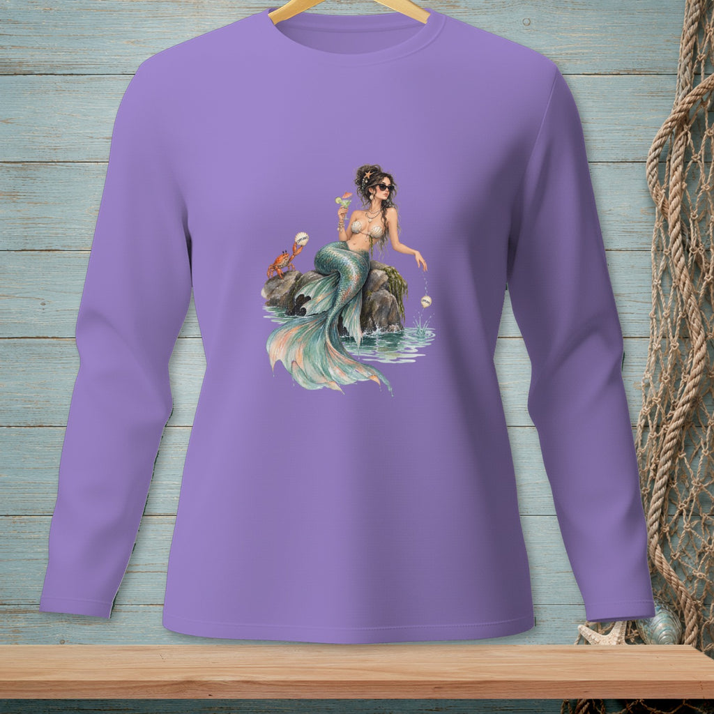 Purple long-sleeve shirt with a mermaid design sitting on rocks with a crab.