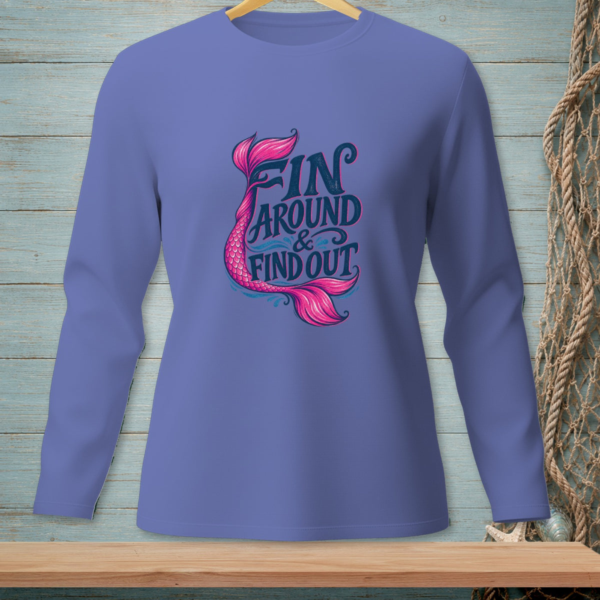Long-sleeve shirt with mermaid graphic and text "FIN AROUND & FIND OUT."
