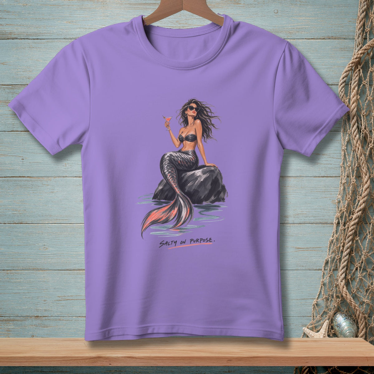 Purple t-shirt with a graphic of a mermaid holding a drink and the text "SALTY ON PURPOSE".
