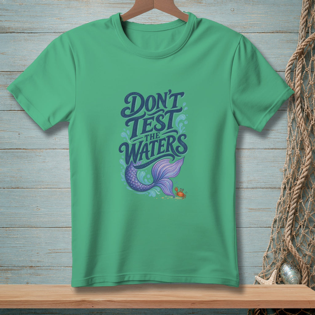 Green t-shirt with text "DON'T TEST the WATERS" and mermaid tail graphic.