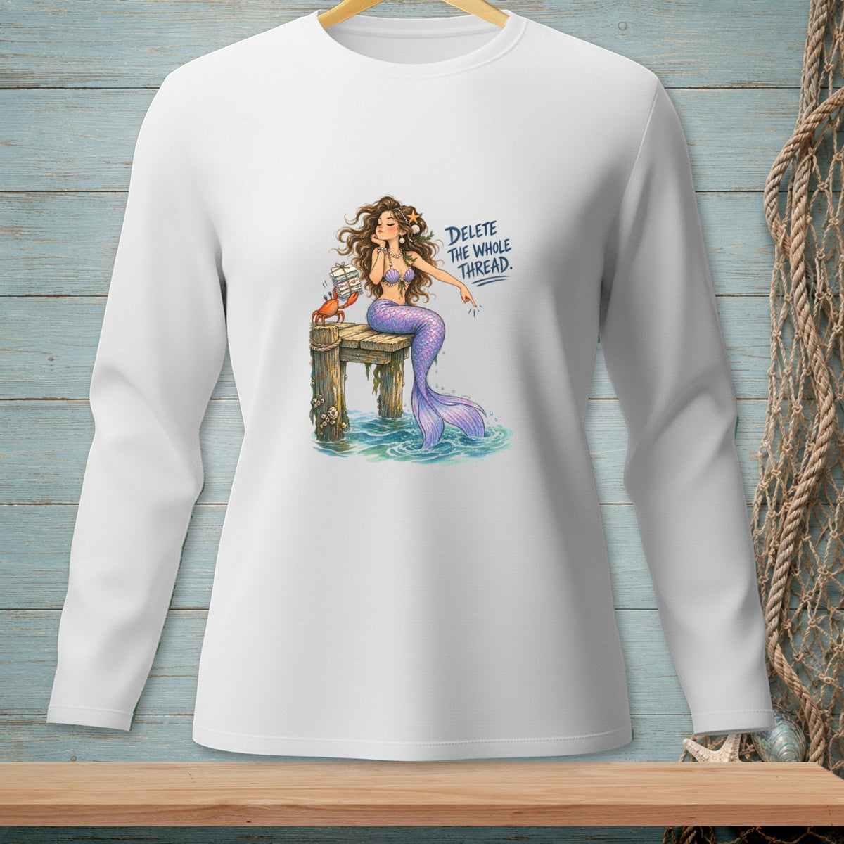 Mermaid with crab and text "DELETE THE WHOLE THREAD." on white shirt.