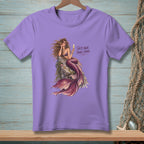 Purple t-shirt with a mermaid illustration and text that reads "Salty Hair. Fancy Drink."