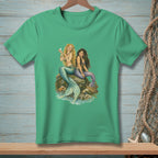 Two mermaids with detailed tails sit on rocks by the water, one holding a pearl.