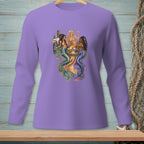 Three mermaids sit at a table with drinks and snacks, printed on a purple long-sleeve shirt.
