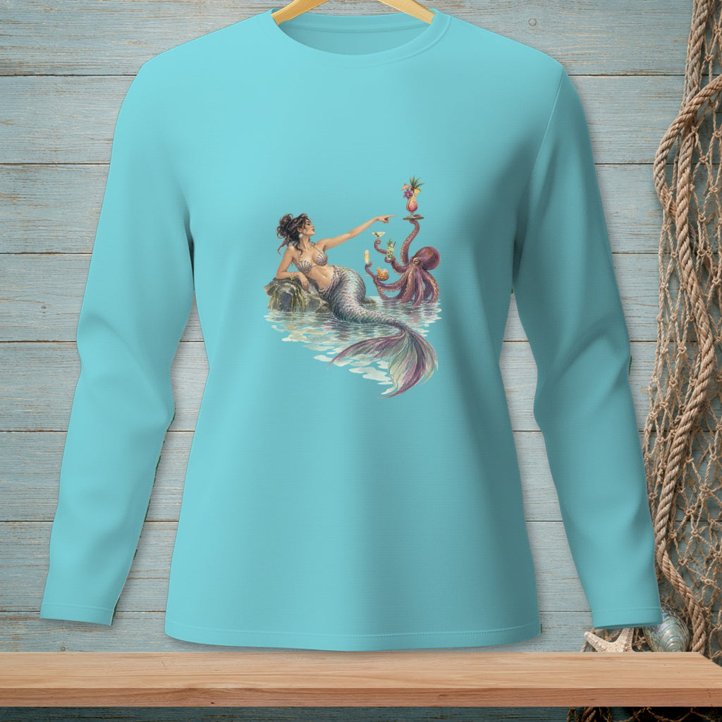 Mermaid reaching for a drink served by an octopus on a light blue long-sleeved shirt.
