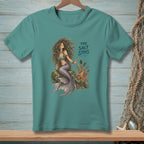 Teal t-shirt graphic with mermaid, octopus, and text "THE SALT STAYS."