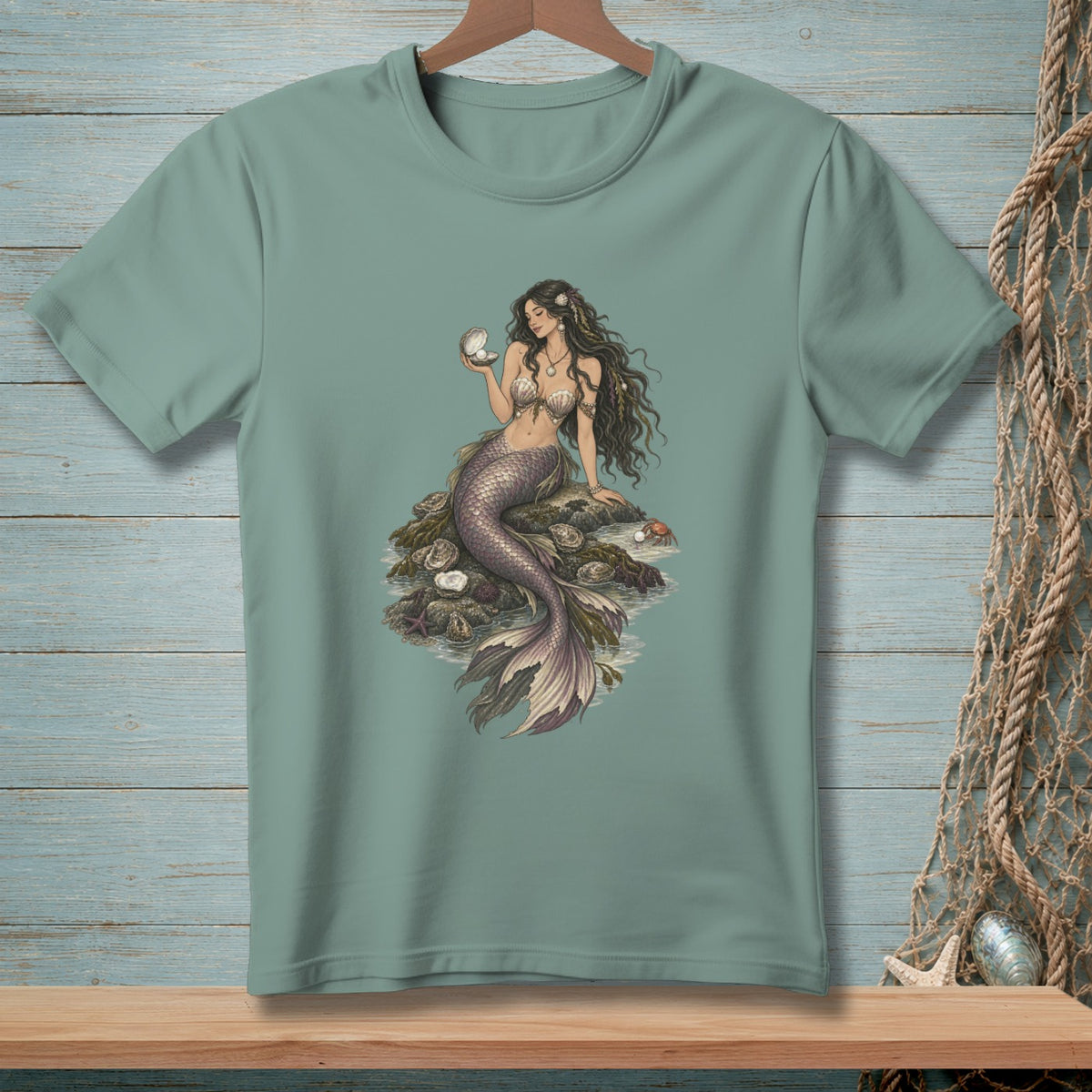 T-shirt with a detailed illustration of a mermaid holding a pearl.