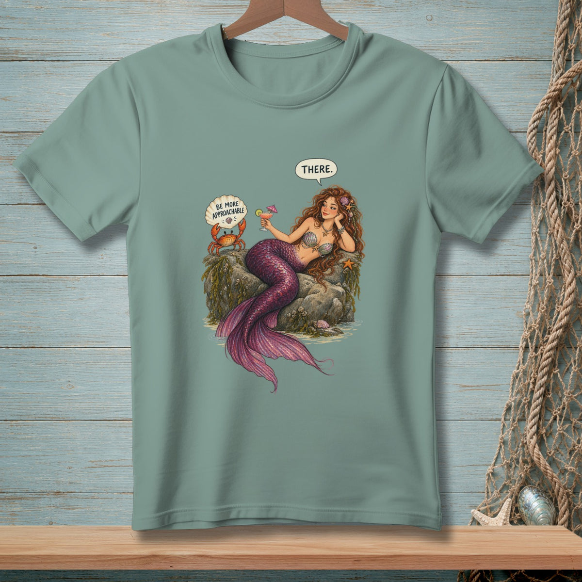 Illustration of a mermaid and crab on rocks, with text bubbles.