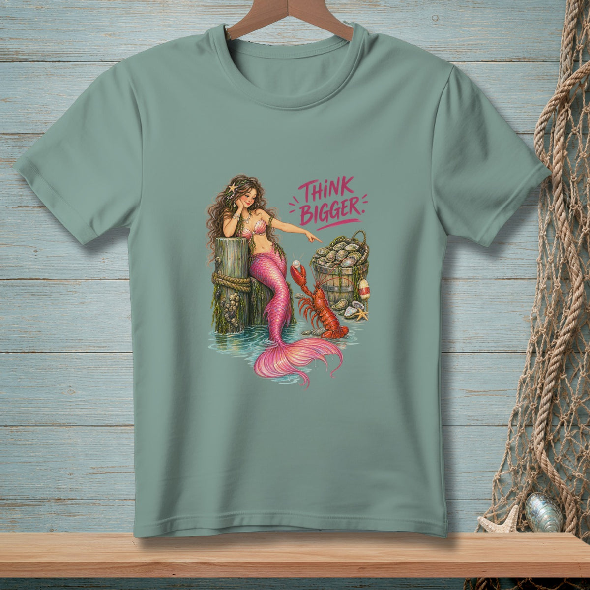 Mermaid points at bucket of shellfish with lobster and text "THINK BIGGER".
